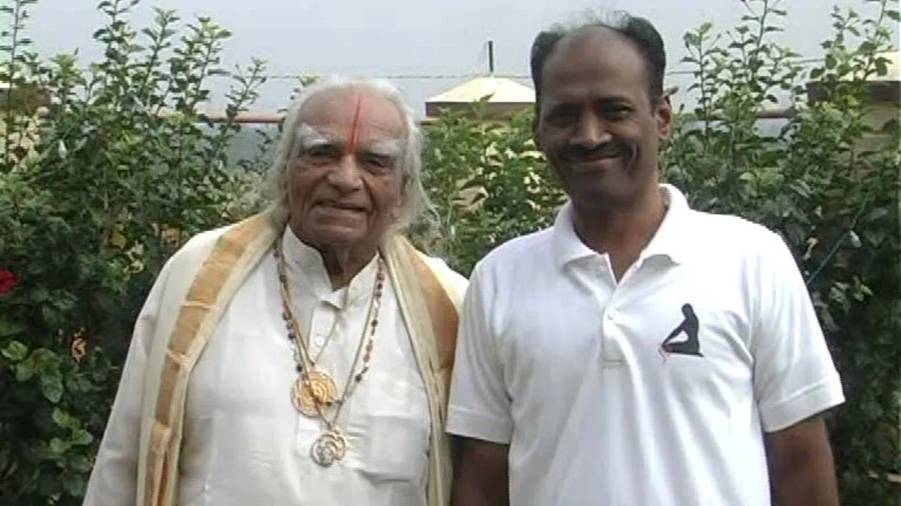 Narayan Sir standing beside B.K.S. Iyengar